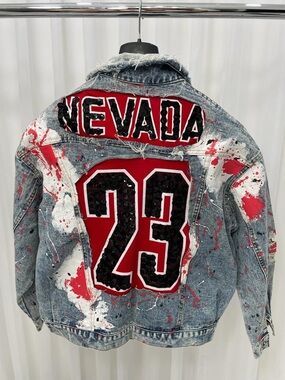 Blue Distressed Denim Jacket with Red 'Nevada 23' Graphic